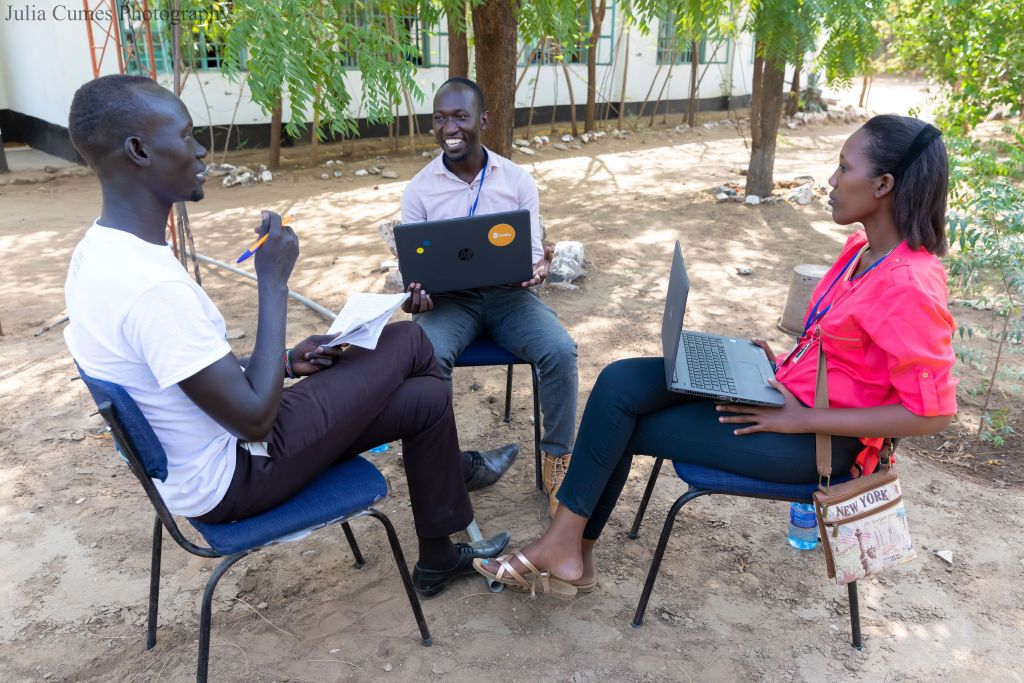 Refugee College Guidance Counselors Ella (right) and Sadiki (center). Photo: Julia Cumes, 2018