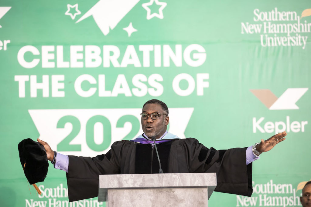 Man giving address at graduation ceremony