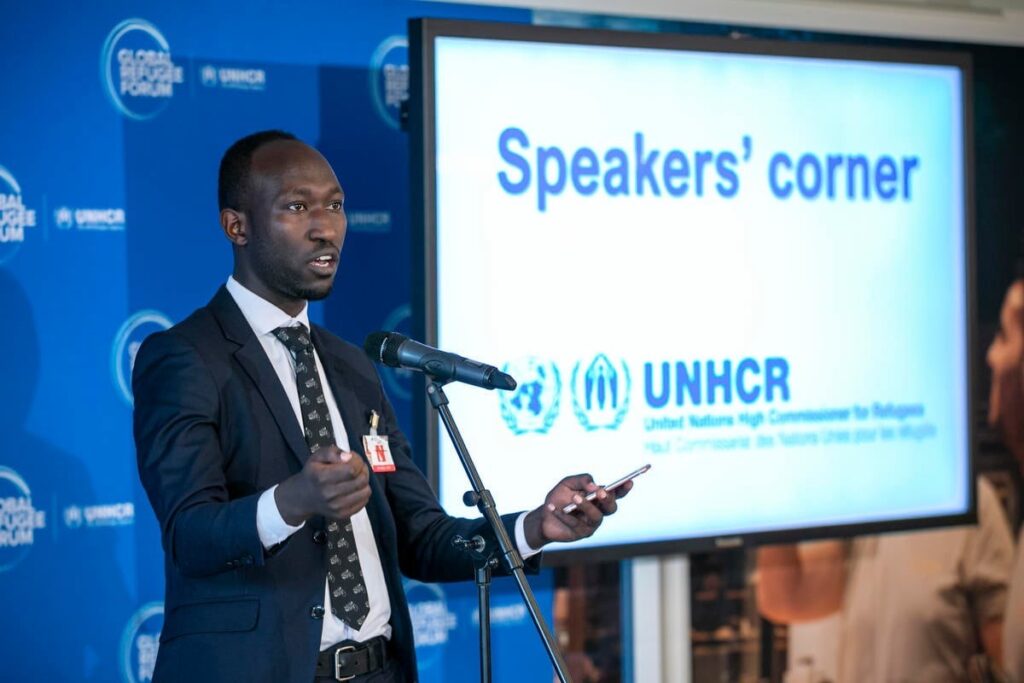 UNHCR speaker at microphone